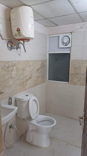Bathroom in 3 BHK Apartment at Amrapali Golf Homes, Sector 4 Greater Noida – for Rent