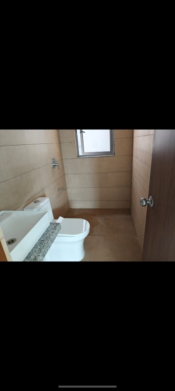 Bathroom in 2 BHK Apartment at Kalpataru Immensa, Kolshet Road – for Rent