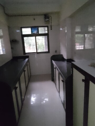 Kitchen in 2 BHK Apartment at Namo Shanti Dham CHS, Borivali West – for Rent