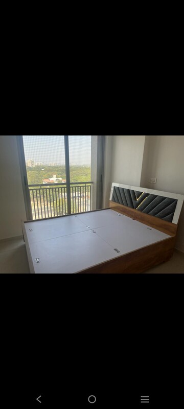 Bedroom in 3 BHK Apartment at HN Safal Orchid Harmony, Shela – for Rent