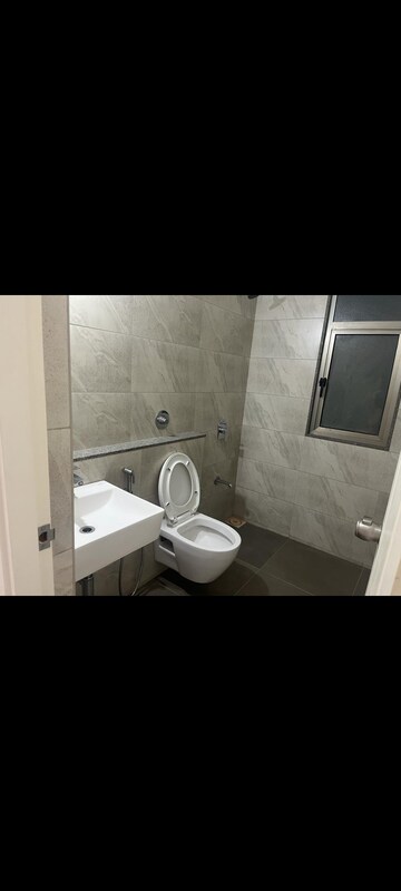 Bathroom in 3 BHK Apartment at HN Safal Orchid Harmony, Shela – for Rent