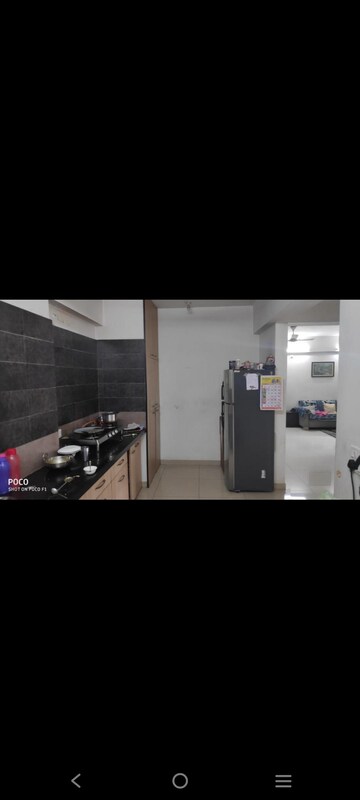 Kitchen in 3 BHK Apartment at HN Safal Orchid Harmony, Shela – for Rent