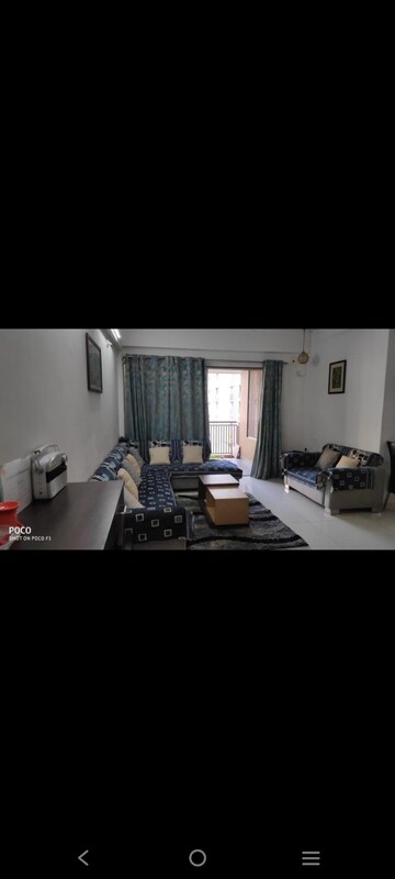 Living Room in 3 BHK Apartment at HN Safal Orchid Harmony, Shela – for Rent