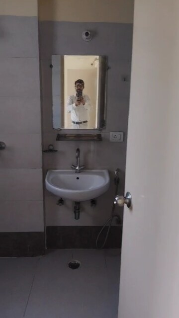 Bathroom in 2 BHK Apartment at MCC Signature Heights, Raj Nagar Extension – for Rent