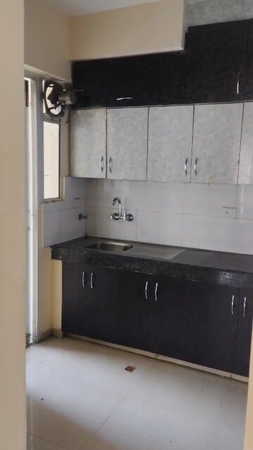 Kitchen in 2 BHK Apartment at MCC Signature Heights, Raj Nagar Extension – for Rent