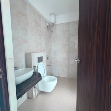 Bathroom in 2 BHK Apartment at Raymond Ten X Habitat, Swastik Garden – for Rent