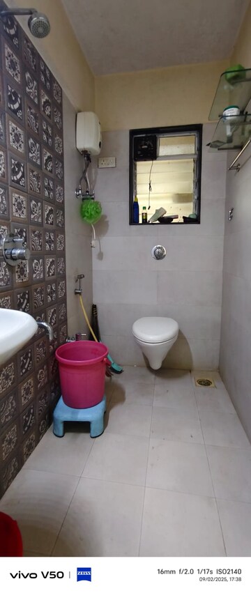 Bathroom in 1 BHK Apartment at Mhatre Royal CHS, Dahisar West – for Rent