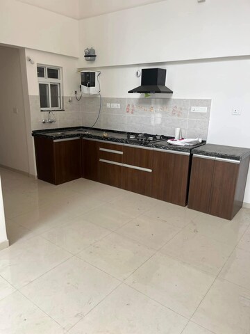 Kitchen in 2 BHK Apartment at Gera World of Joy, Kharadi – for Rent