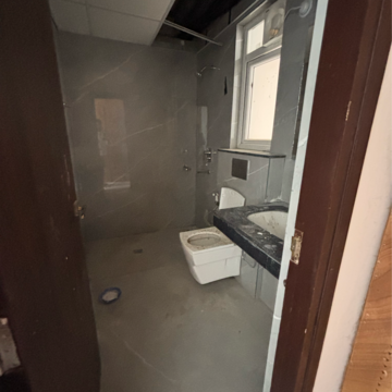 Bathroom in 3 BHK Apartment at Rishita Manhattan, Sarsawan – for Rent