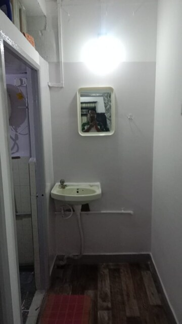 Bathroom in 1 RK Apartment at Nagari Niwara CHS, Goregaon East – for Rent
