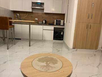 Kitchen in Studio Apartment at Nimbus The Golden Palm, Sector 168 – for Rent