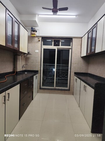 Kitchen in 2 BHK Apartment at Tilak Shanti CHS, Tilak Nagar – for Sale