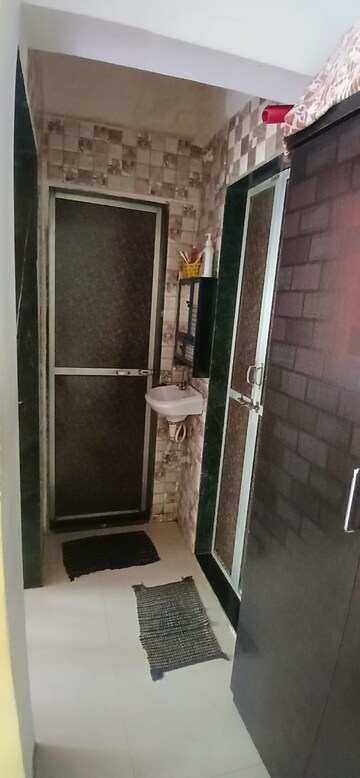 Bathroom in 1 BHK Apartment at Kopar Khairane Sector 19 – for Sale