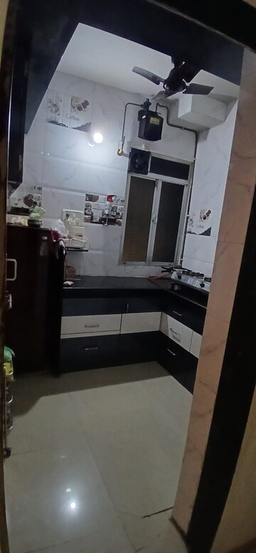 Kitchen in 1 BHK Apartment at Kopar Khairane Sector 19 – for Sale