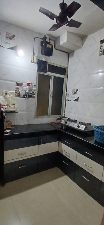 Kitchen in 1 BHK Apartment at Kopar Khairane Sector 19 – for Sale