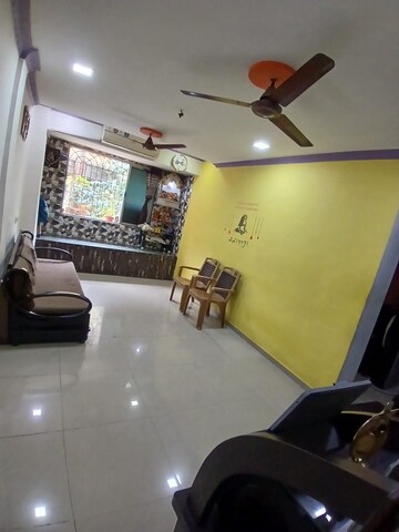 Living Room in 1 BHK Apartment at Kopar Khairane Sector 19 – for Sale