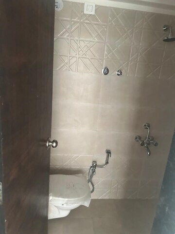 Bathroom in 2 BHK Apartment at Rajesh Raj Infinia, Malad West – for Rent