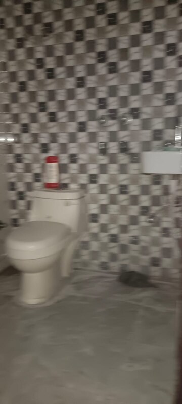 Bathroom in 3 BHK Builder Floor at Maan Heights, Gaur City 1 – for Rent