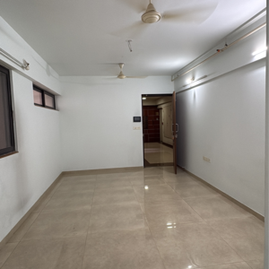 Living Room in 2 BHK Apartment at Lodha Lakeshore Greens, Hedutane – for Sale