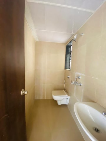Bathroom in 1 BHK Apartment at Runwal My City, Dombivli East – for Rent