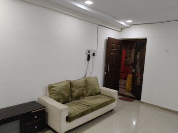 Living Room in 2 BHK Apartment at RNA NG Suncity Phase III, Kandivali East – for Rent