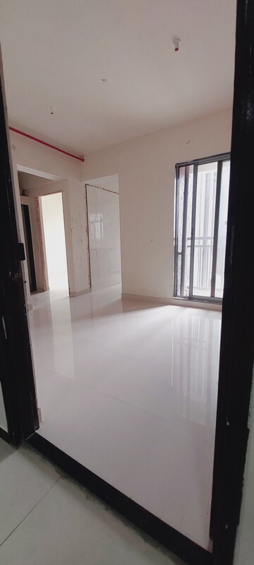 Living Room in 1 BHK Apartment at Laxmi Aangan Kharadipada, Khardipada – for Sale