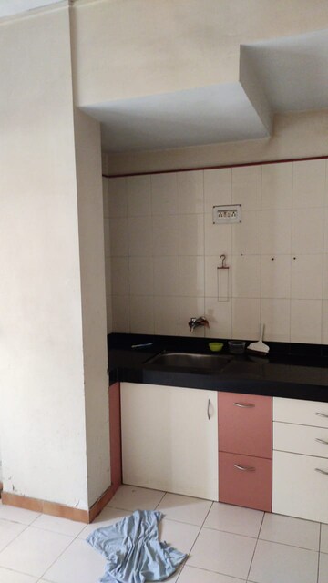 Kitchen in 3 BHK Apartment at Karan Palms, Warje – for Rent
