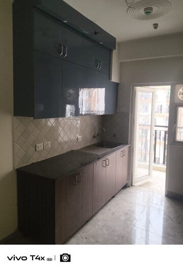 Kitchen in 3 BHK Apartment at Amrapali Terrace Homes, Tech Zone 4 Greater Noida – for Rent