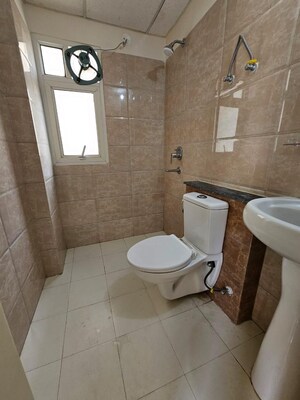 Bathroom in 2.5 BHK Builder Floor at Wave City, Wave City – for Sale