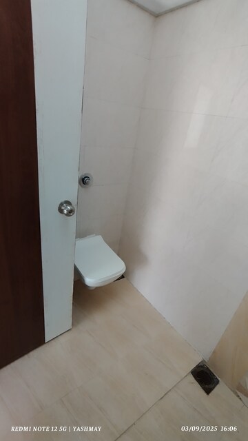 Bathroom in 2 BHK Apartment at Heena Presidency, Mira Road – for Sale