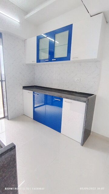 Kitchen in 2 BHK Apartment at Heena Presidency, Mira Road – for Sale