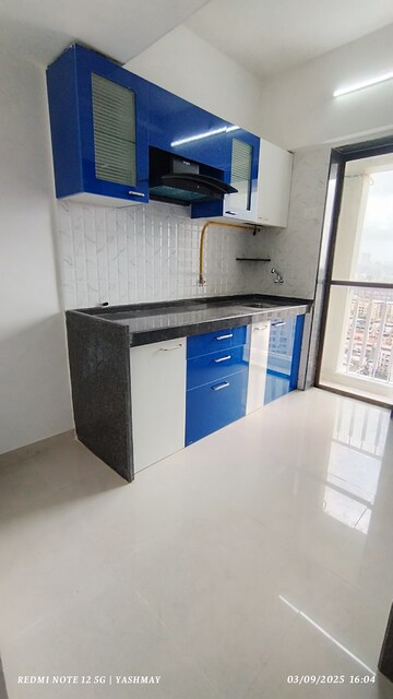 Kitchen in 2 BHK Apartment at Heena Presidency, Mira Road – for Sale