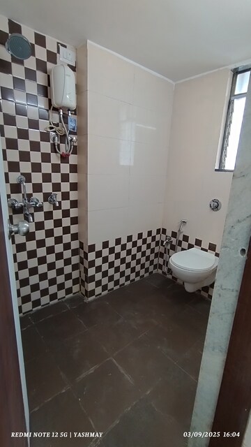 Bathroom in 2 BHK Apartment at Heena Presidency, Mira Road – for Sale