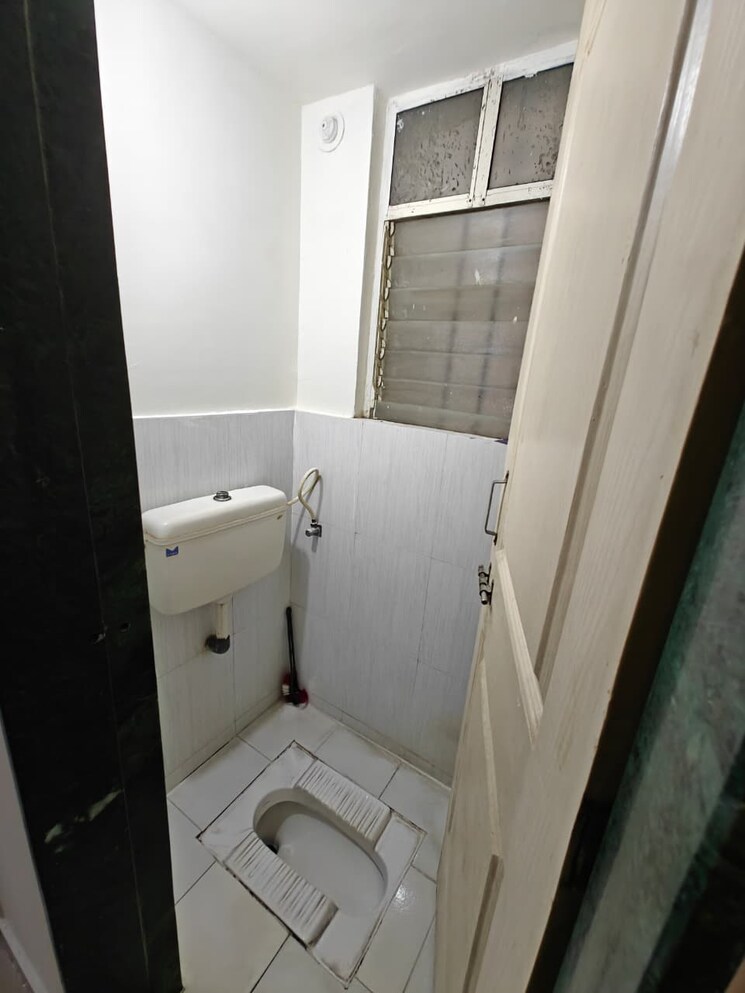 Bathroom, nisarg-hardik-phase-ii 1 Bedroom 598 Sq.Ft. Apartment In Rahatani Pune 9139168