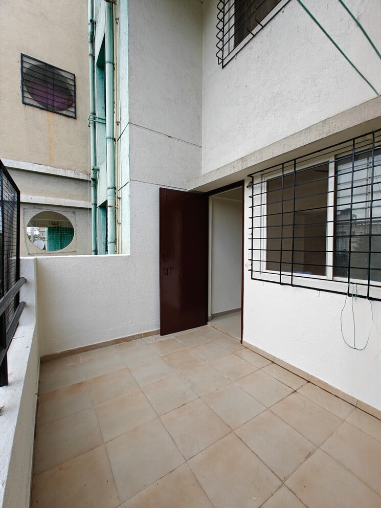 Kitchen, nisarg-hardik-phase-ii 1 Bedroom 598 Sq.Ft. Apartment In Rahatani Pune 9139168