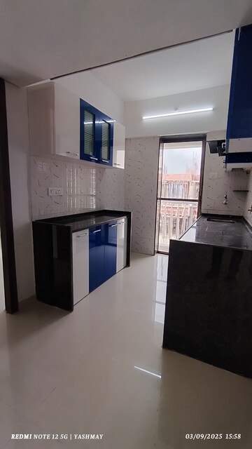 Kitchen in 1 BHK Apartment at Heena Presidency, Mira Road – for Sale