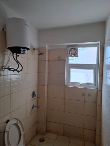 Bathroom in 3 BHK Apartment at Tulip Petals, Sector 89 – for Sale