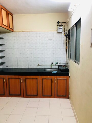 Kitchen in 1 BHK Apartment at Wadgaon Sheri – for Rent