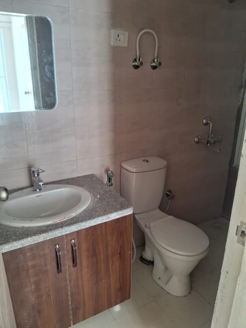 Bathroom in 2.5 BHK Apartment at Sector 10 Greater Noida – for Rent