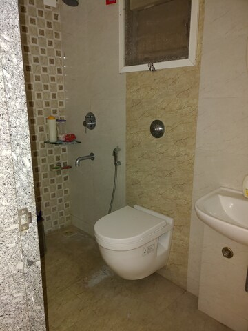 Bathroom in 2 BHK Apartment at Axis Paradigm Whistling Meadows, Paud Road – for Rent