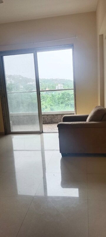 Living Room in 2 BHK Apartment at Axis Paradigm Whistling Meadows, Paud Road – for Rent