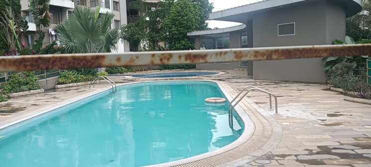 Swimming Pool, axis-paradigm-whistling-meadows 2 Bedroom 1000 Sq.Ft. Apartment In Paud Road Pune 9139596