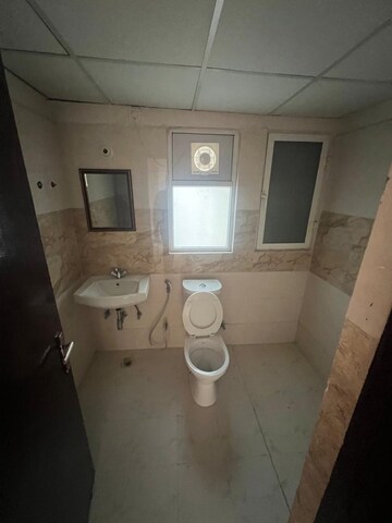 Bathroom in 2.5 BHK Apartment at Amrapali Kingswood, Sector 4 Greater Noida – for Rent