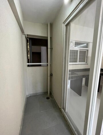 Building Lobby in 2 BHK Apartment at Mantra Insignia, Mundhwa – for Rent