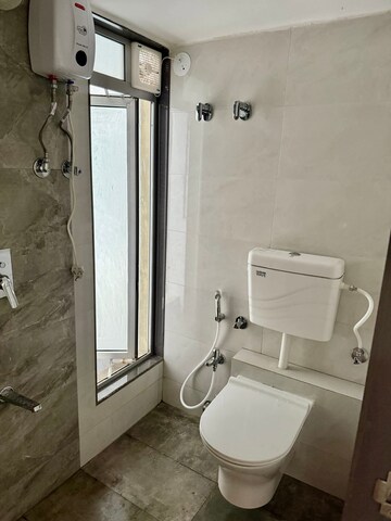 Bathroom in 2 BHK Apartment at Mansarovar Pearl Gardens, Vasai West – for Rent