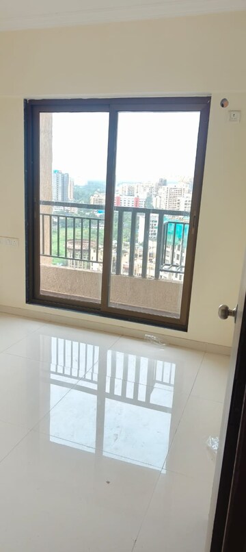 Room in 2 BHK Apartment at Raunak City Sector 4, Kalyan West – for Rent