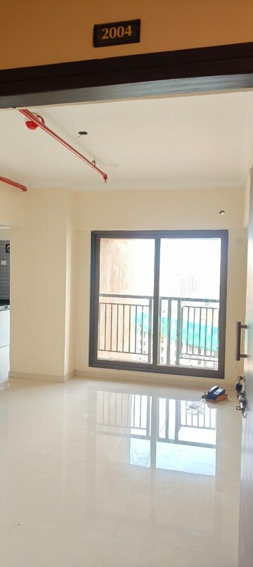 Room in 2 BHK Apartment at Raunak City Sector 4, Kalyan West – for Rent