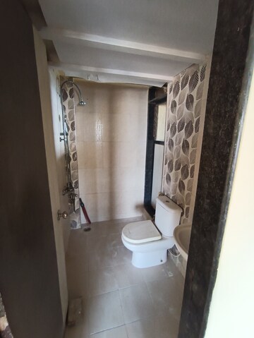 Bathroom in 1 BHK Apartment at Ajmera Yogi Dham Phase III, Kalyan West – for Rent