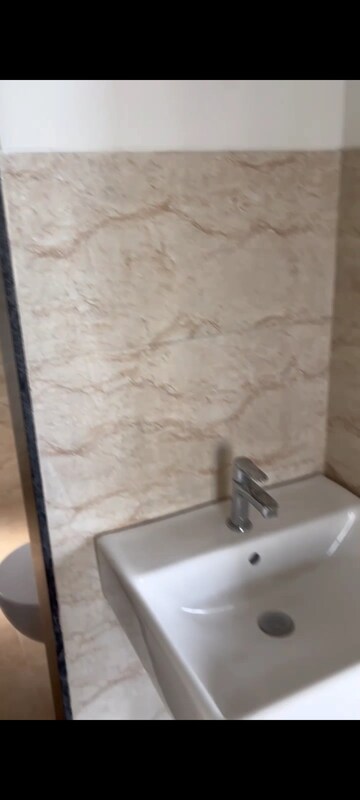 Bathroom in 2 BHK Apartment at Shapoorji Pallonji Sensorium, Hinjewadi – for Sale