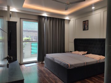 Bedroom in 4 BHK Builder Floor at Palam Vihar – for Rent